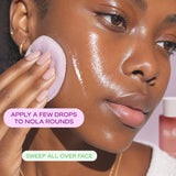 Applying Witches Brew toner with a cotton round to show how to use it.