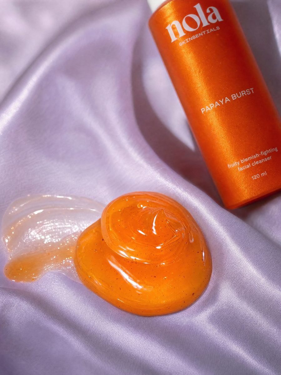 Papaya Burst cleanser gel texture swatch showing its smooth consistency.