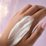 Baby Skin cleanser texture spread across the back of a hand.