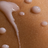 Hydra Hottie Serum texture swatched on skin showing its lightweight milky consistency